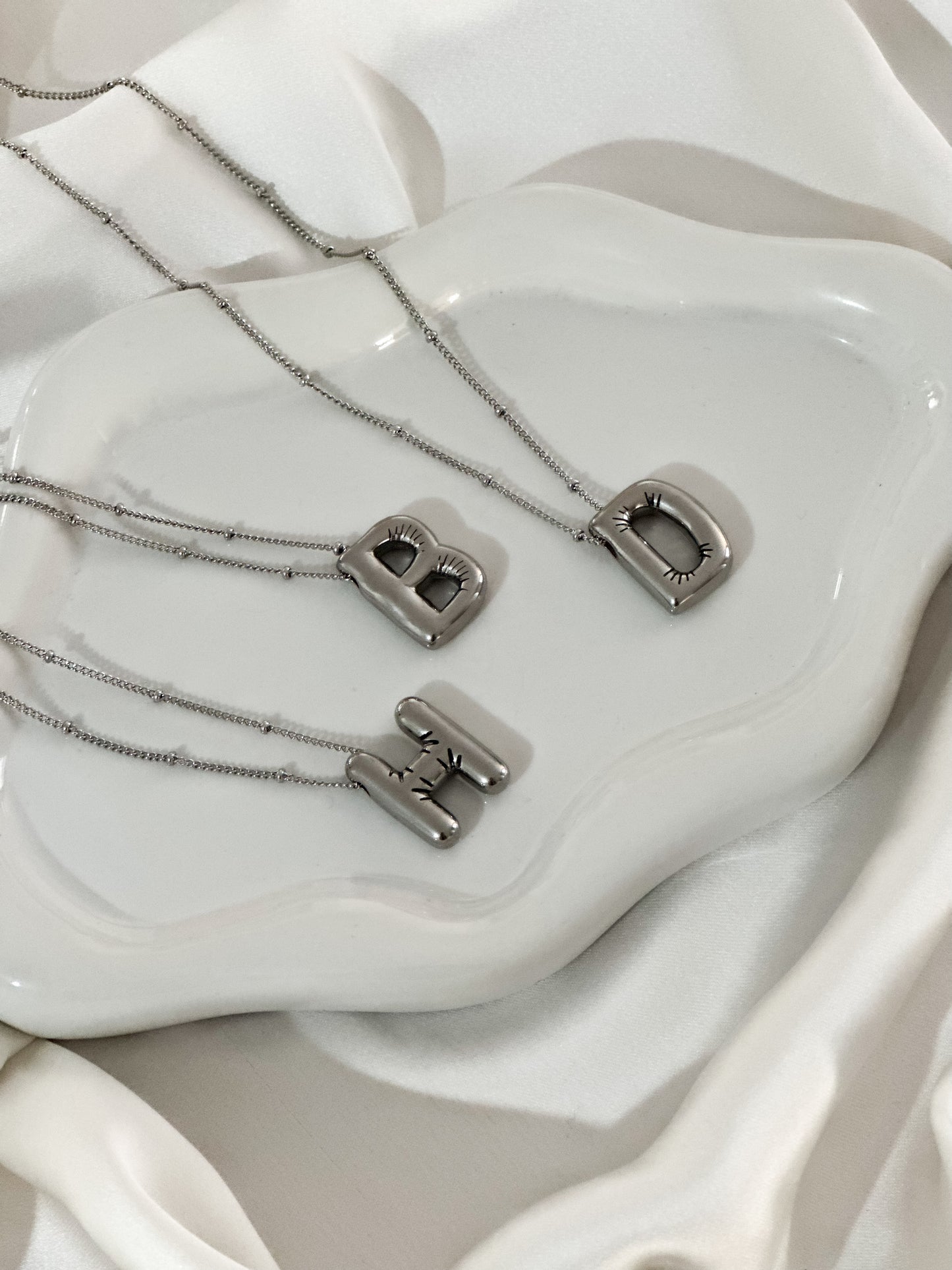 Collier « Initiale » argenté