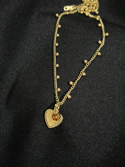 "Heart and charm" necklace